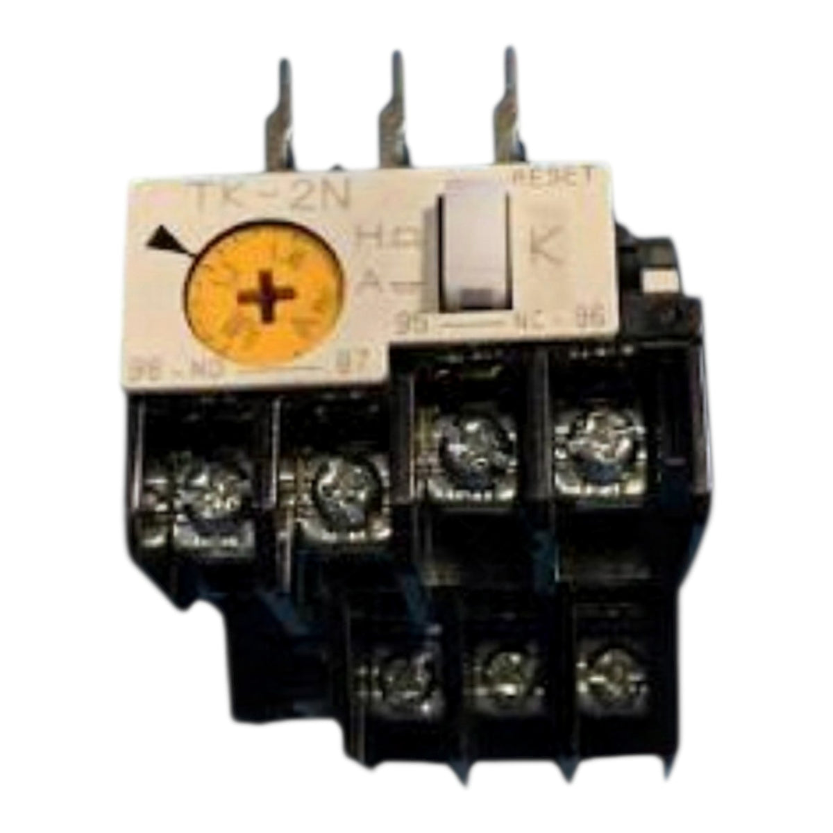 An electrical contactor relay component, model TK-2N, featuring a black plastic housing, silver metal terminals, a white reset switch, and a yellow dial indicator on the top cover.