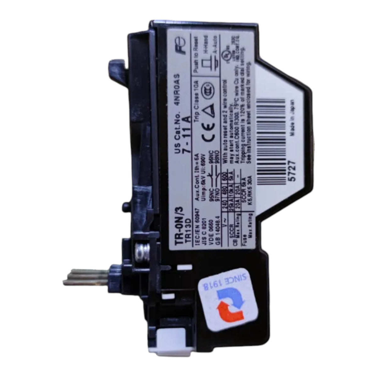 A black electrical contactor or relay component with a white technical specification label and a small blue and red sticker, photographed on a plain white background.