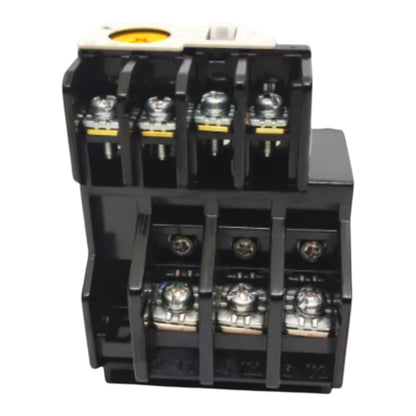A black plastic electrical terminal block with six screw terminals, featuring a yellow and white top cover, isolated on a white background.