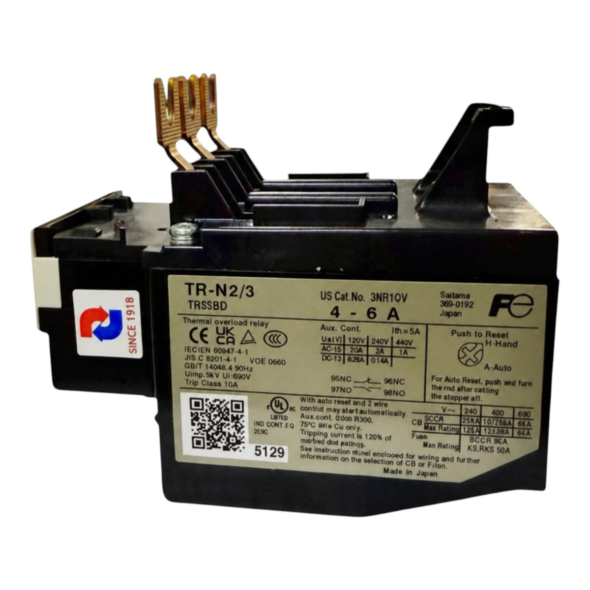 A black industrial electrical contactor relay, model TR-N2/3 TR85BD, with gold-colored terminal posts and a white specification label on the front face.