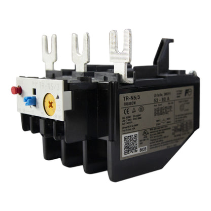 A black industrial thermal overload relay with silver metal terminal posts, a white terminal block with red and blue screws, and a printed technical specification label on the side.