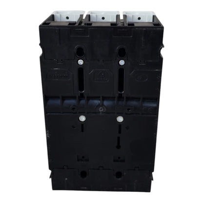 A black plastic electrical terminal block with three white plastic connector sockets at the top, shown against a plain white background.