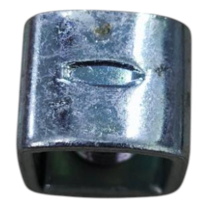 Metallic cylindrical object with a central hole on a white background