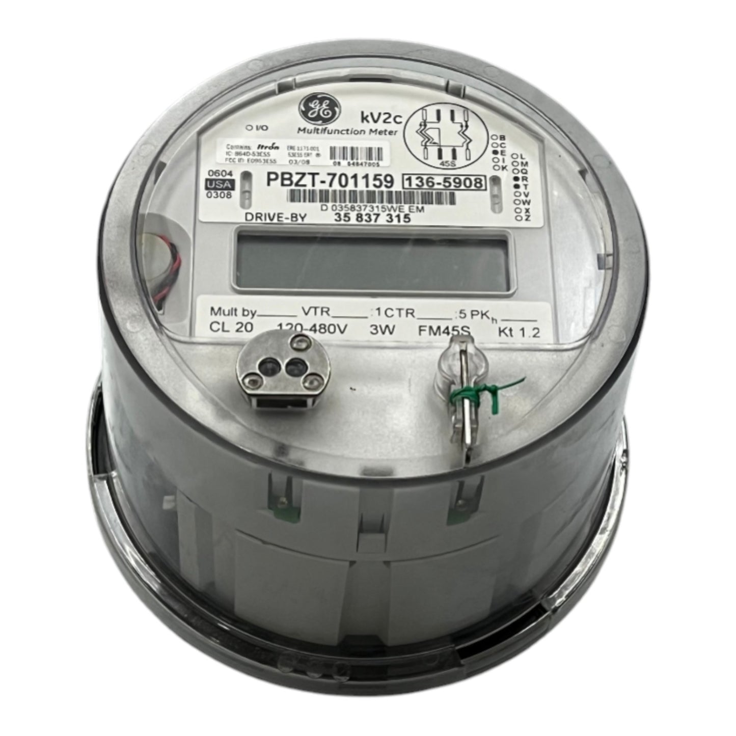 A GE 3-phase industrial digital watt-hour meter, model PBZT-701159, featuring a gray metal casing, a clear protective top cover, and an LCD display window.