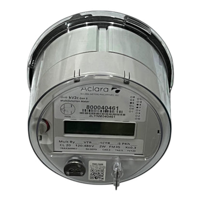 An Aclara multi-function meter with a brushed silver metal cylindrical body, a clear protective cover, a digital display window, and a hanging key, shown against a plain white background.