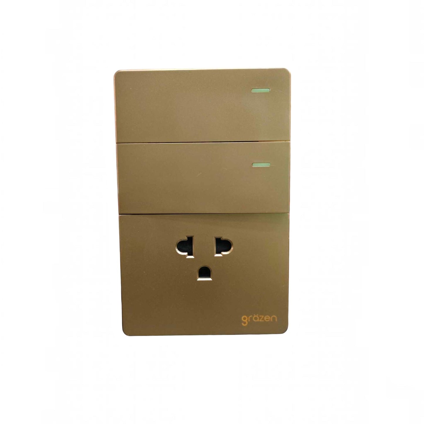 A wall-mounted three-outlet power adapter with a brushed gold finish and the 'grêten' brand logo in the bottom right corner, set against a plain white background.
