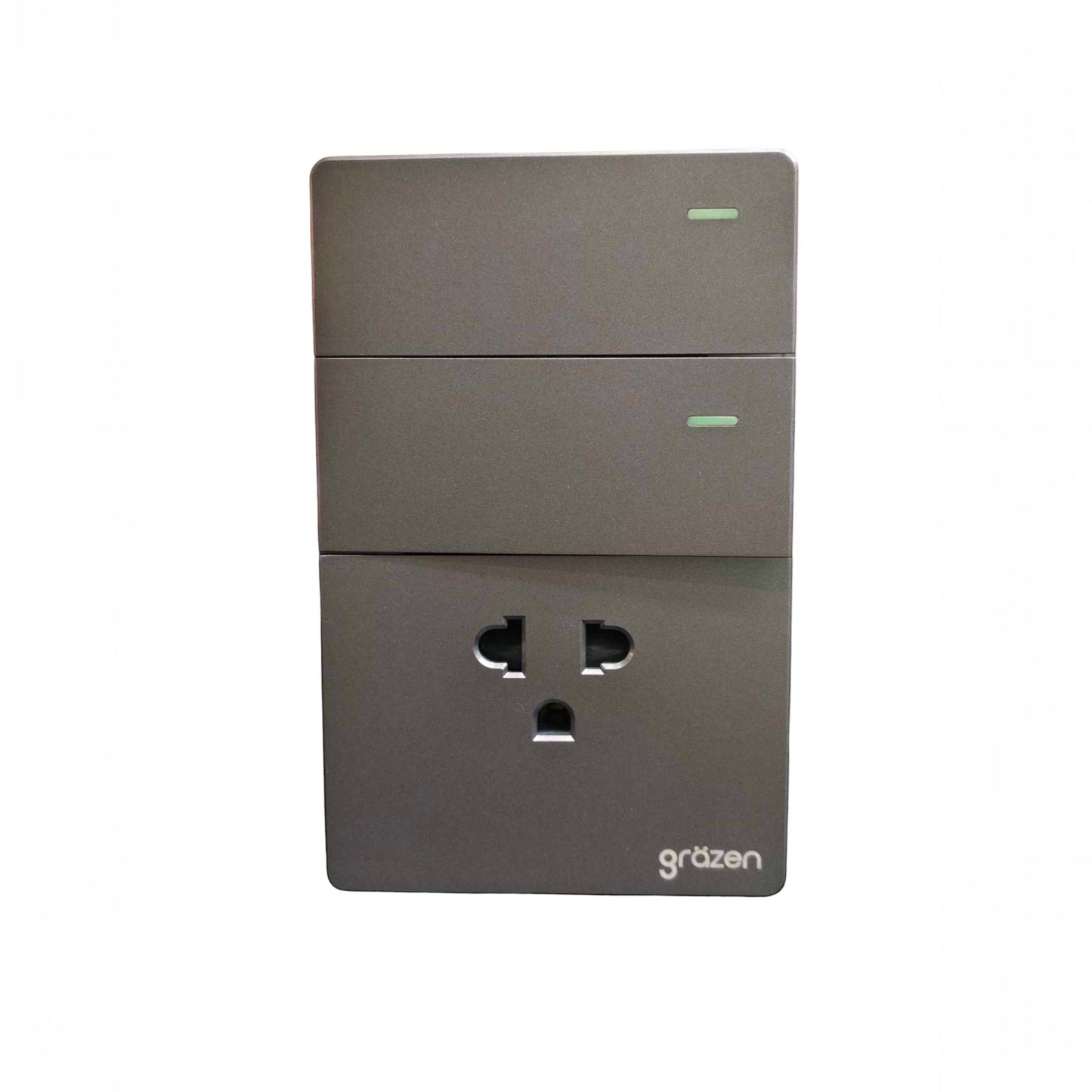 A modern three-button wall outlet socket cover with integrated power buttons on top and a standard three-pin outlet on the bottom, finished in a matte dark gray color with the 'gräzen' brand logo in the lower right corner.