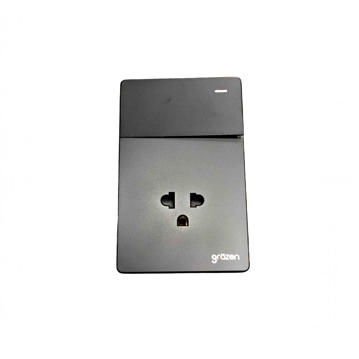 A modern wall-mounted dual outlet power strip in a dark gray metallic finish, featuring the 'gräzen' brand logo in the bottom right corner, set against a plain white background.