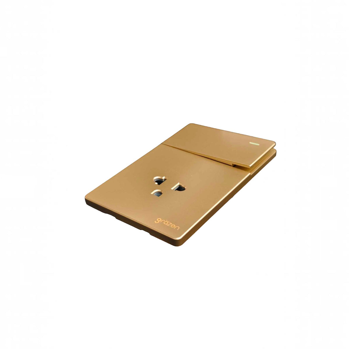 A modern gold-colored wall switch plate with an integrated power outlet and a small sliding cover, shown on a plain white background.