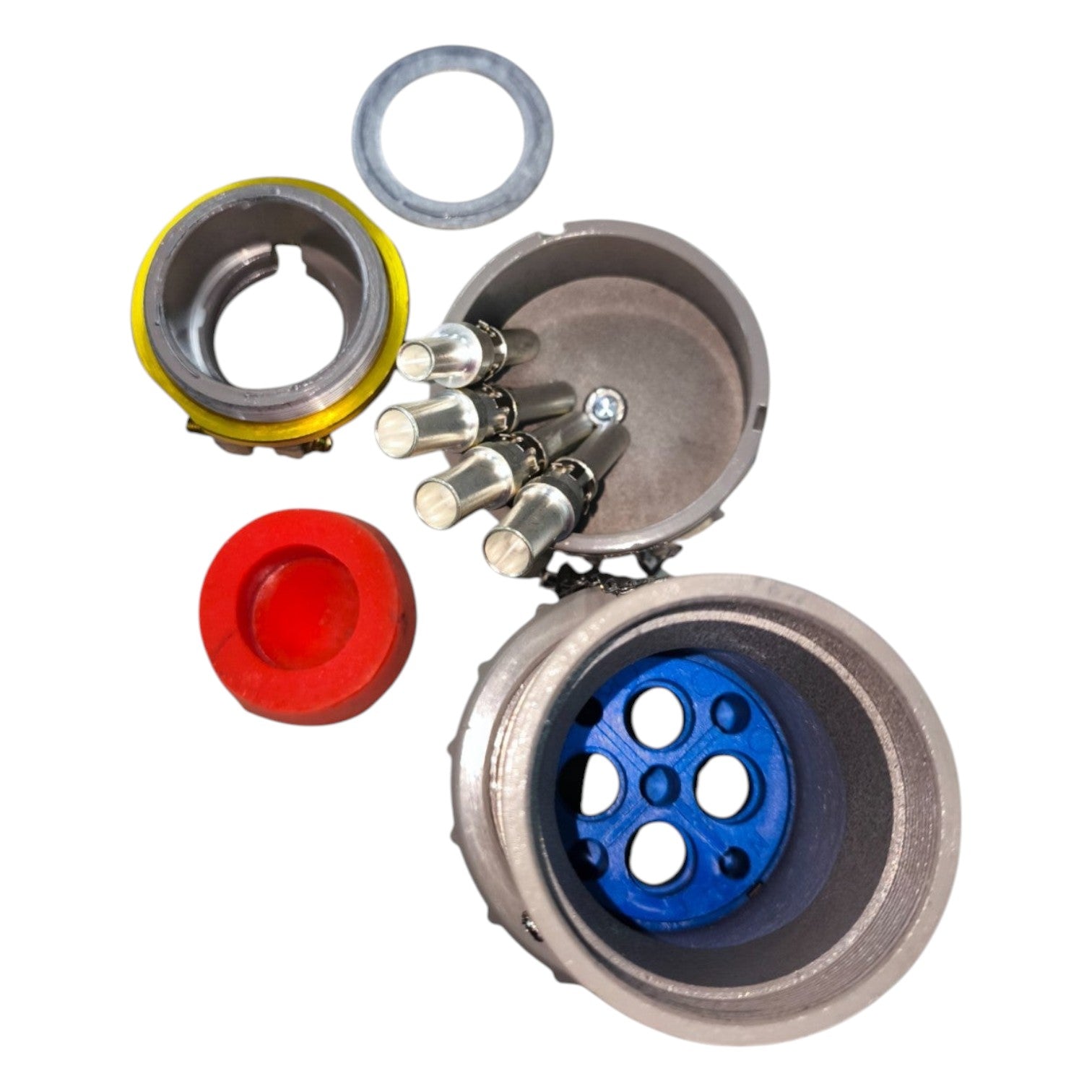 Mechanical components including a red cap, blue bearing, and metal parts on a white background