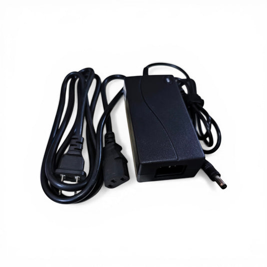 Black power adapter with cable on a white background