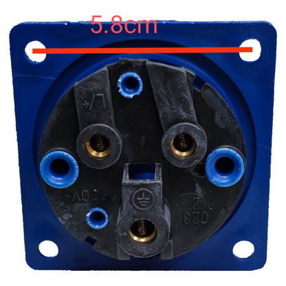 Electrical socket with blue cover and visible wiring, measurement label '5.8cm' above.