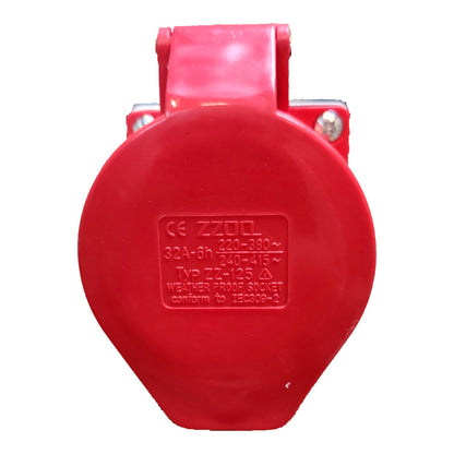 A red plastic weatherproof socket outlet with molded technical specifications printed on the front face, isolated on a white background.