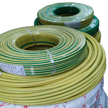 Three coiled rolls of yellow and green electrical wire or cable, wrapped in clear plastic with white labels, stacked on a white bag against a white background.