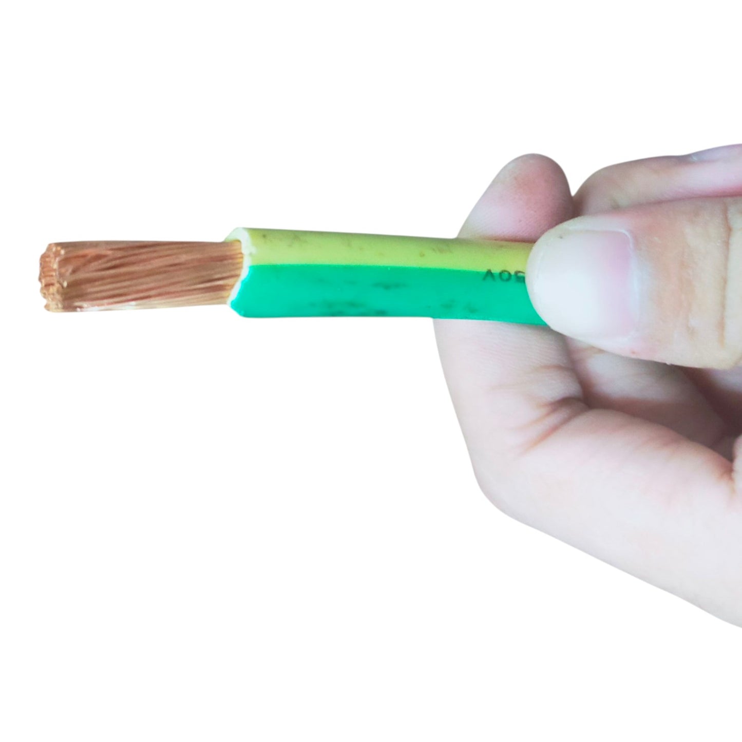 A close-up of a hand holding a green and yellow insulated electrical wire connector with exposed copper strands, shown against a plain white background.