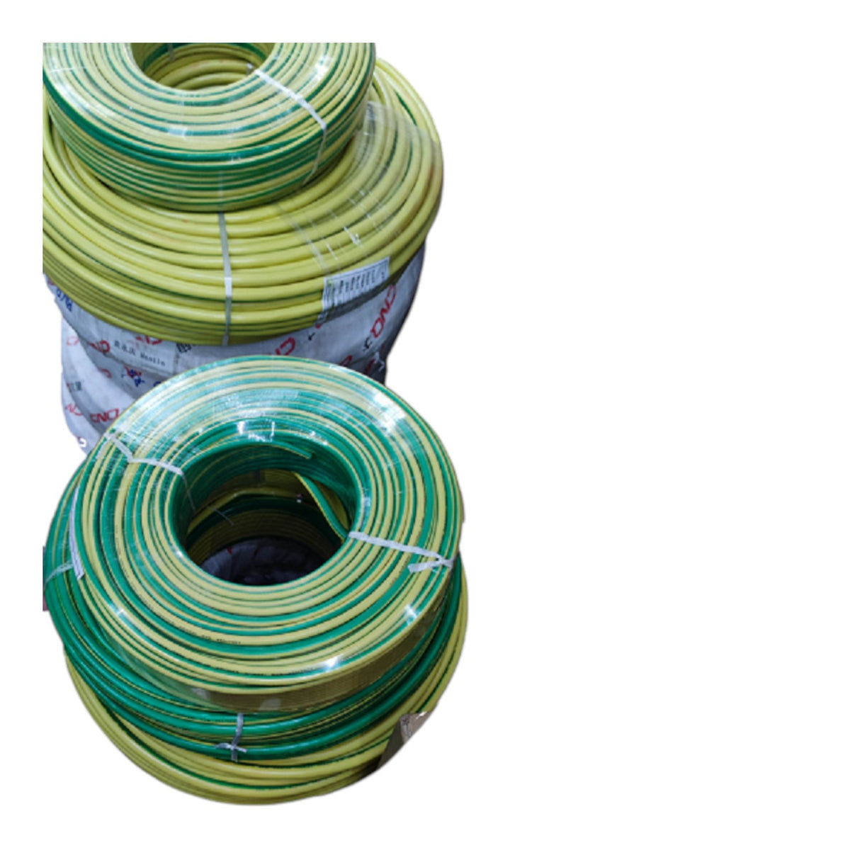 Two coiled rolls of green and yellow cable or wire, stacked on a plain white background.