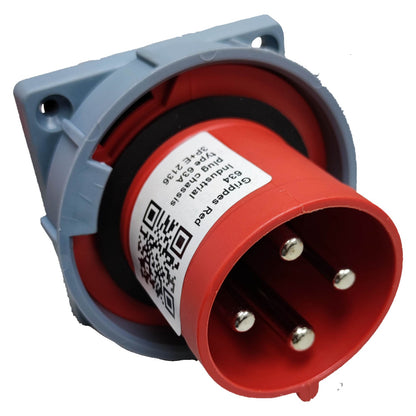 Red electrical plug with gray body on a white background