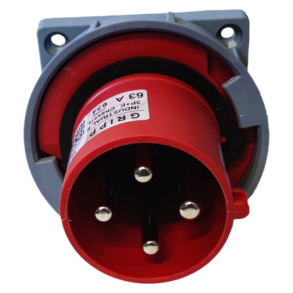 Red electrical plug with gray housing on a white background