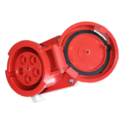 Red electrical connector on a white background