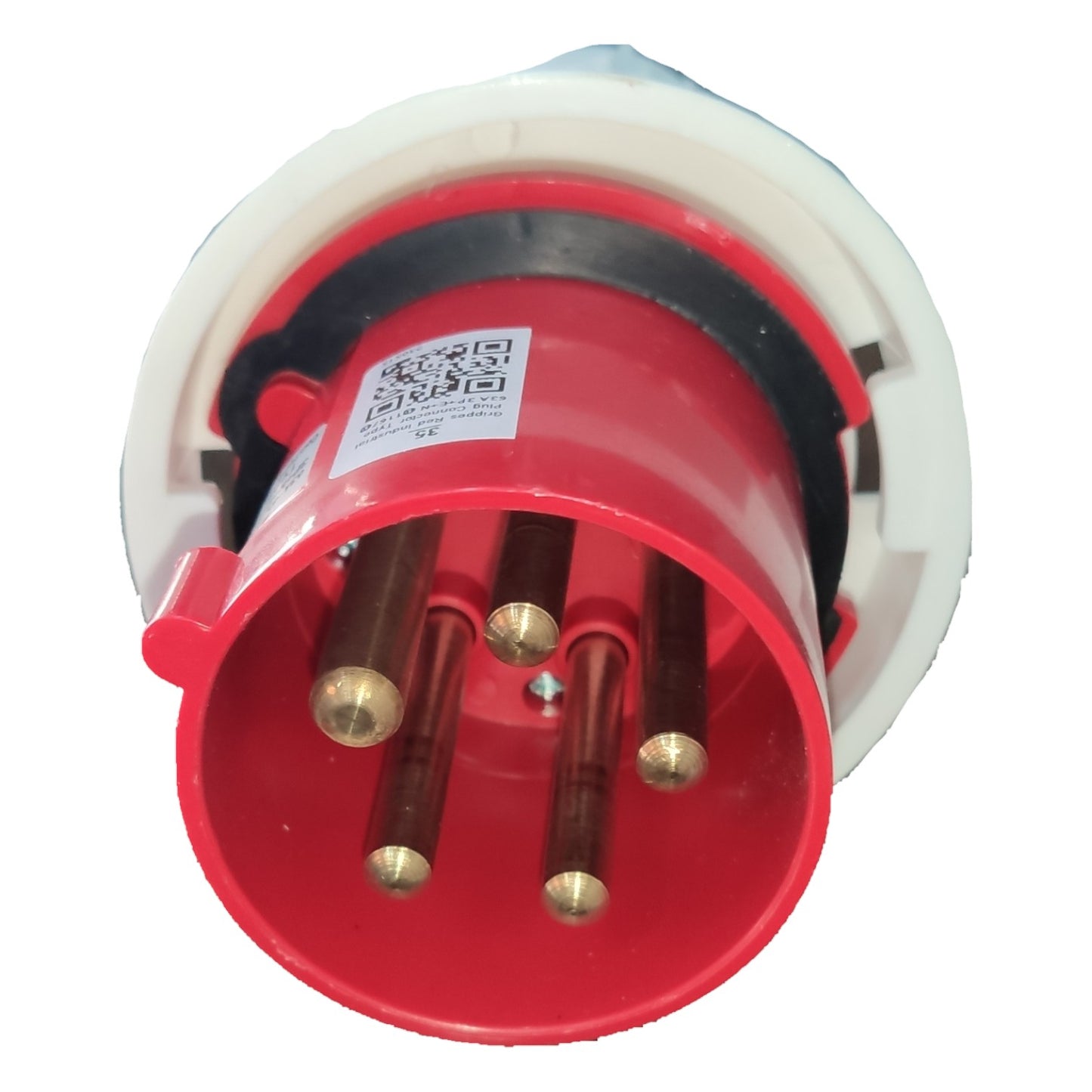 Red electrical plug with brass pins on a white background