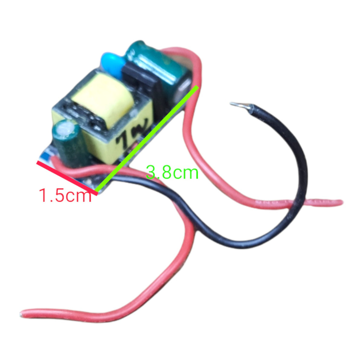 A small electronic transformer component with attached red and black wires on a white background, overlaid with green measurement lines and red/black text labels showing dimensions 1.5cm, 3.