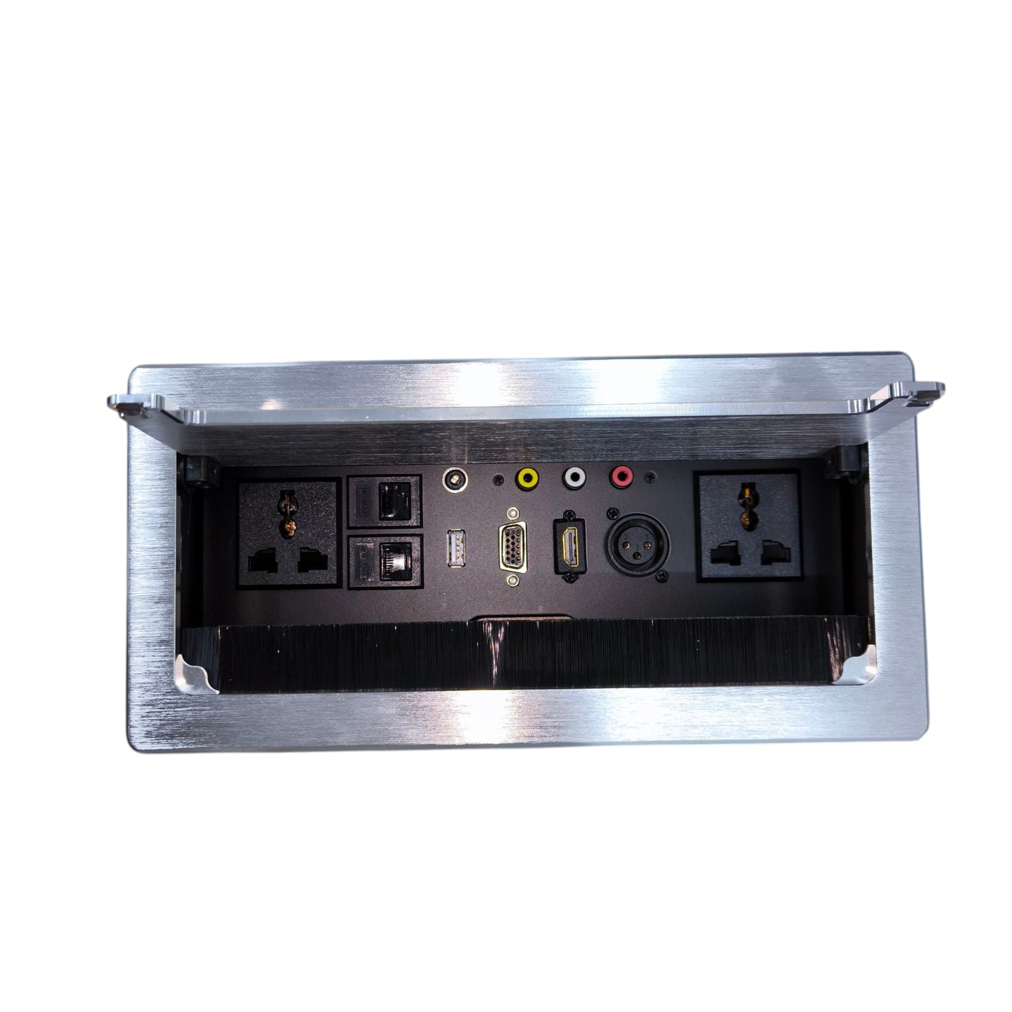 A brushed stainless steel under-desk power outlet cover with its lid open, revealing multiple electrical outlets, switches, and audio/video connection ports on a black interior panel, isolated on a white background.