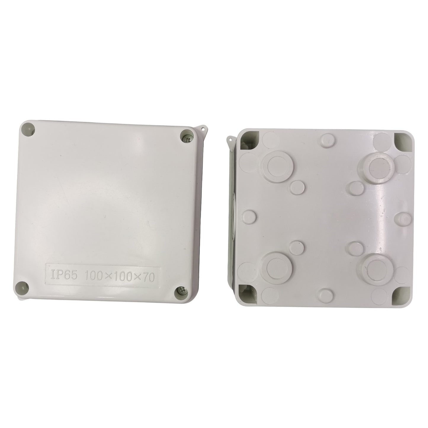 Two gray plastic enclosures with circular cutouts on a white background