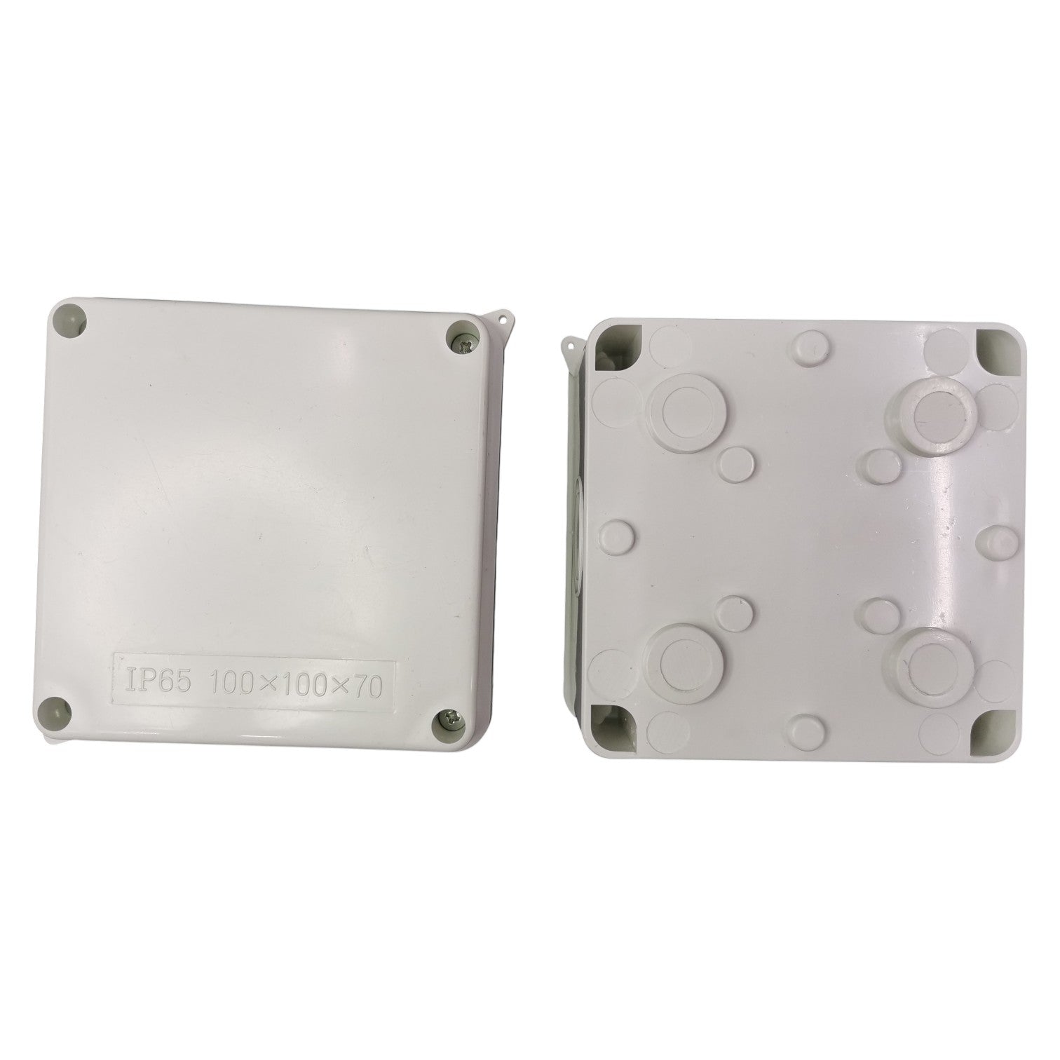 Two gray plastic enclosures with circular cutouts on a white background