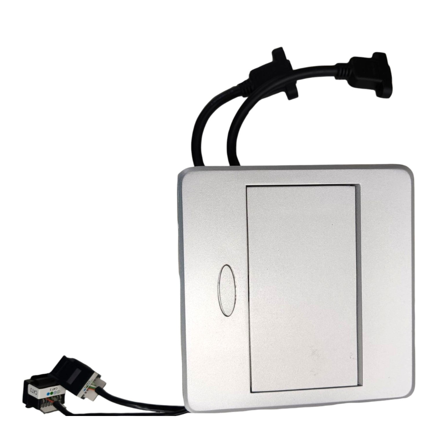 A silver rectangular electronic module with a central recessed panel, a small oval marking, and black cables extending from the top and bottom with connector plugs, shown on a plain white background.