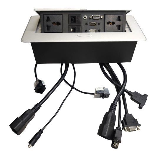 An under-desk power strip with a silver top panel and black base, shown with multiple black power cords and adapters extending downward on a white background.
