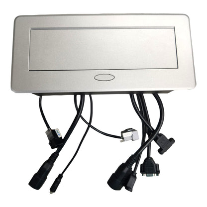 A silver rectangular electronic control panel with a recessed display area and multiple black power cables and connectors extending from the bottom, shown on a plain white background.