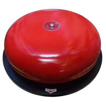 A red dome-shaped fire alarm bell mounted on a black base, shown against a plain white background.