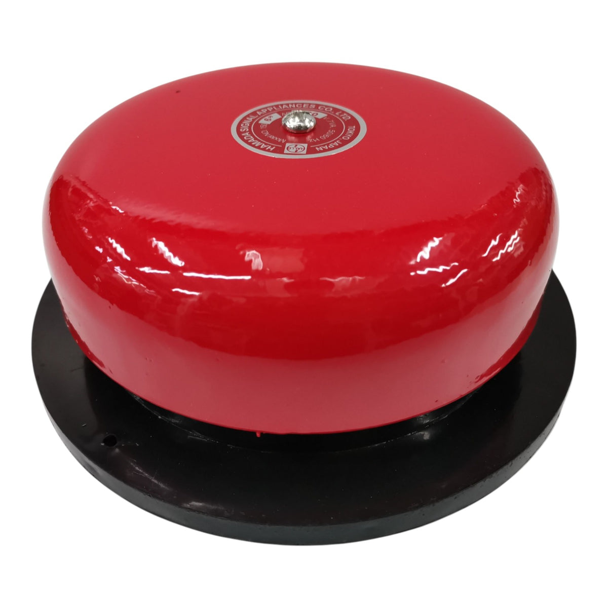 A red dome-shaped fire alarm bell mounted on a black circular base, shown against a plain white background.