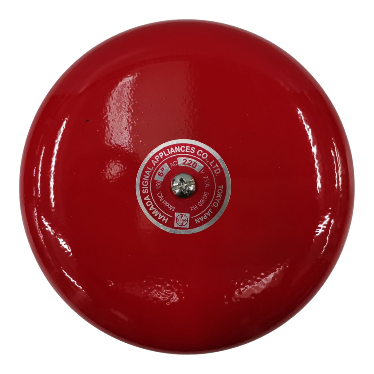 A round red fire alarm bell with a central silver and red label reading 'HARASAKA APPLIANCES CO. LTD.