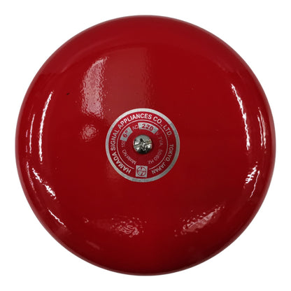 A round red fire alarm bell with a central silver and red label reading 'HARASAKA APPLIANCES CO. LTD.