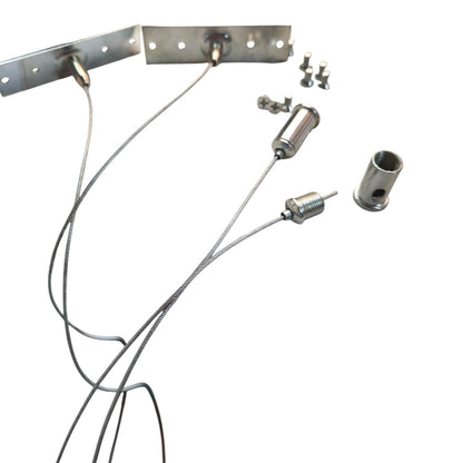 Cable door stopper hardware kit with two metal mounting brackets, two wire cables with small metal cylinders, two mounting screws, and a cylindrical sleeve, shown on a plain white background.