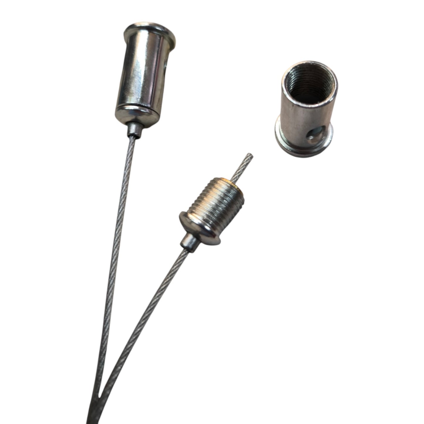Three metallic cable lock components, including two with attached steel cables and one separate cylindrical lock piece, shown on a plain white background.