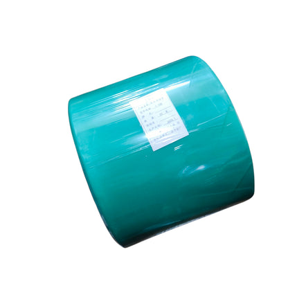 Roll of green plastic sheeting on a white background