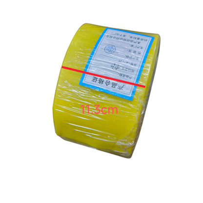 Yellow roll of paper with a label on a white background