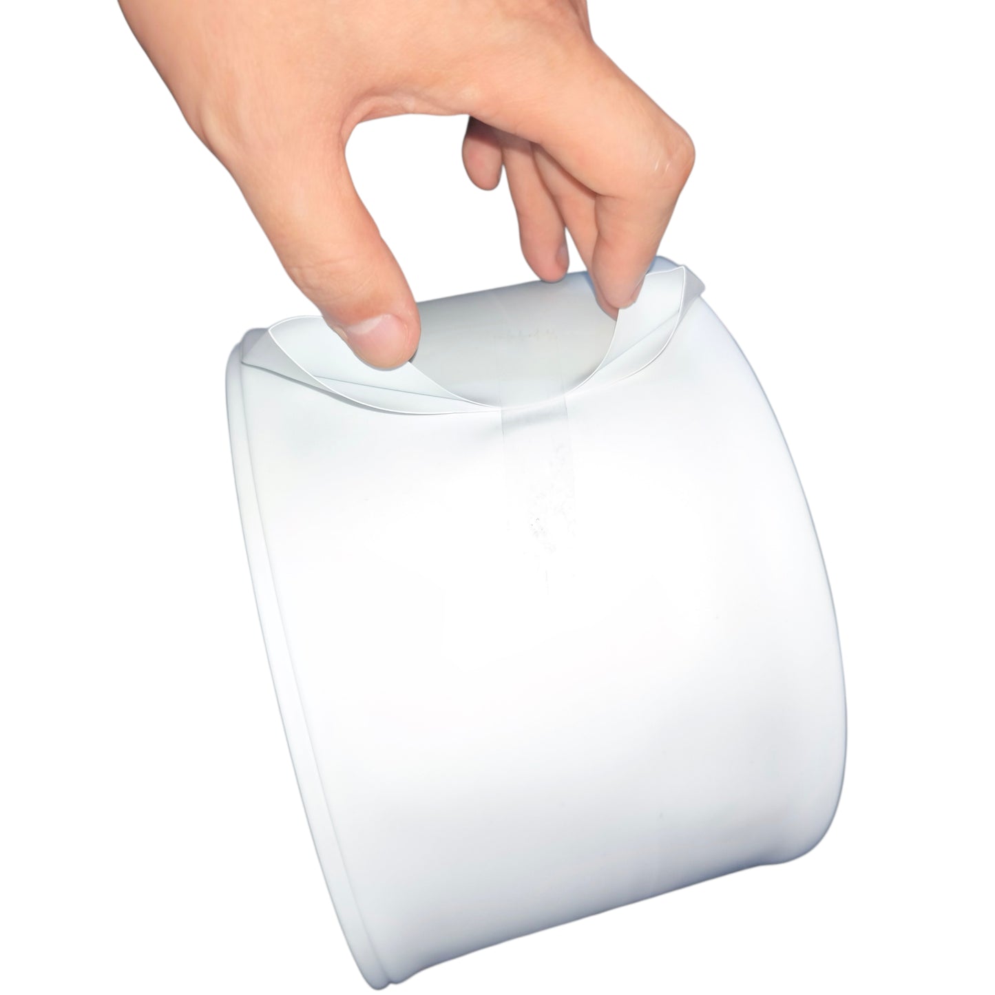 White cylindrical container with a hand lifting the lid on a white background