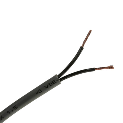 A close-up of a gray multi-core cable with its outer jacket peeled back to show two exposed black-wrapped wires ending in copper-colored tips, on a plain white background.