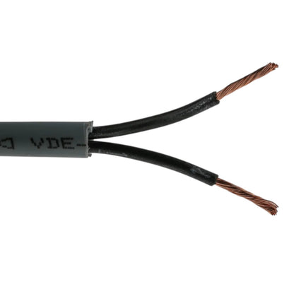 A close-up of a black cable with two exposed twisted copper wire strands, showing the inner conductor color and a gray protective jacket with printed text.