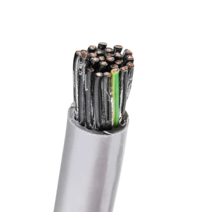 A close-up of a multi-core electrical cable with a silver outer jacket, showing multiple black inner wires with copper-colored tips and a single prominent green wire.