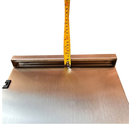 Brushed stainless steel mounting plate of the Himel 500A MCCB NEMA 4X panel housing with tape measure.
