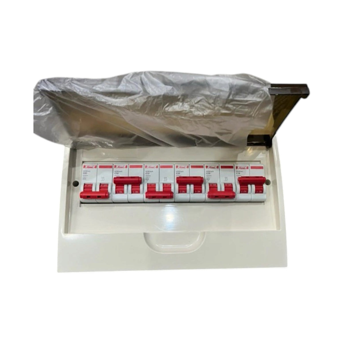 A 6-way modular electrical distribution board with red and white switches, shown open with a protective plastic sheet covering the top panel, on a white background.