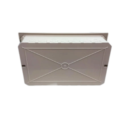 A rectangular plastic vent cover or grille with a hinged top section lifted open, showing a white mesh filter inside. The front features a recessed geometric design with an X pattern and a central circular detail.