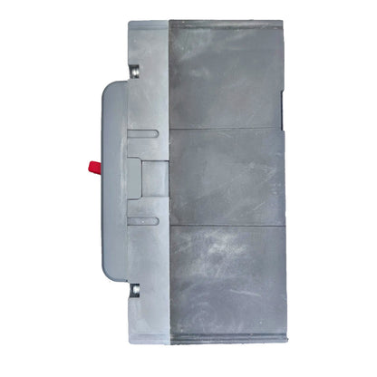 A gray rectangular industrial component or enclosure with a side tab and a small red protruding element, shown on a plain white background.