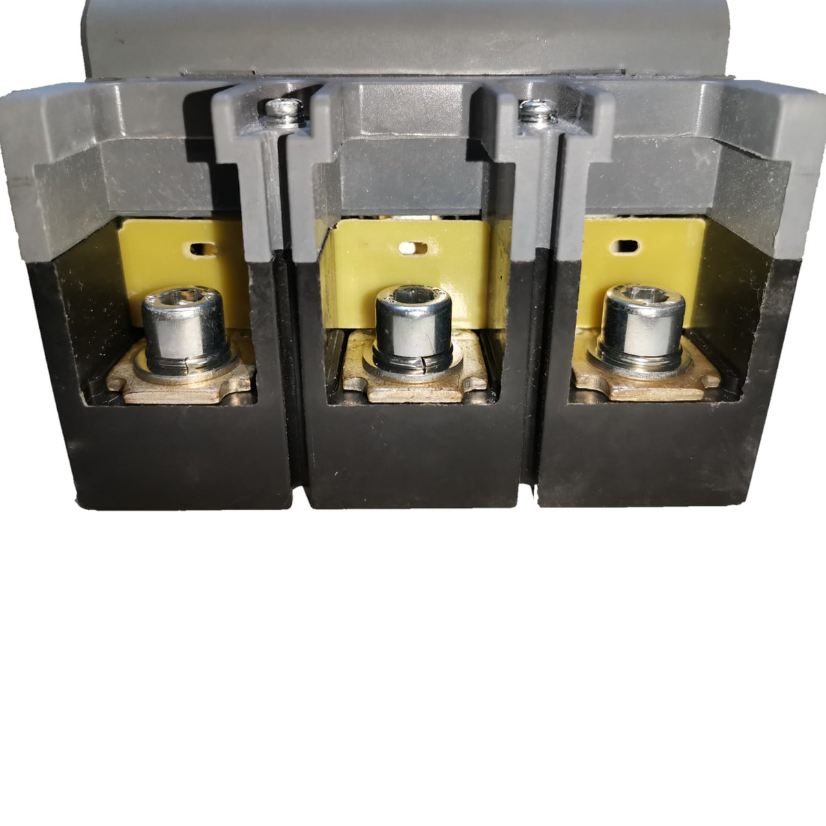 Three electrical contact blocks or terminals with black outer housings, yellow internal plates, and silver metal posts, shown against a plain white background.