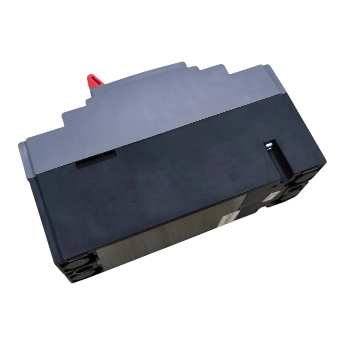 A black and dark gray industrial electrical component or terminal block with a small red handle or tab on top, shown on a plain white background.