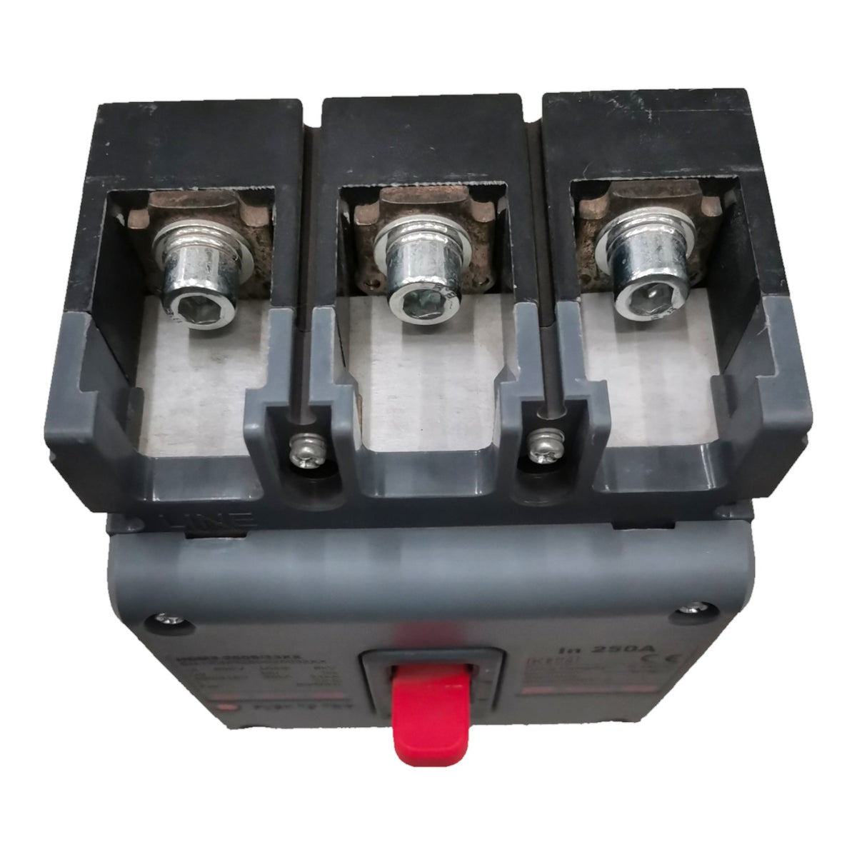 A three-pole electrical circuit breaker with a gray plastic housing, three silver metal terminal posts on top, and a red front handle, shown on a plain white background.